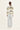 Person wearing a striped sweater and white pants by Verge on a white background