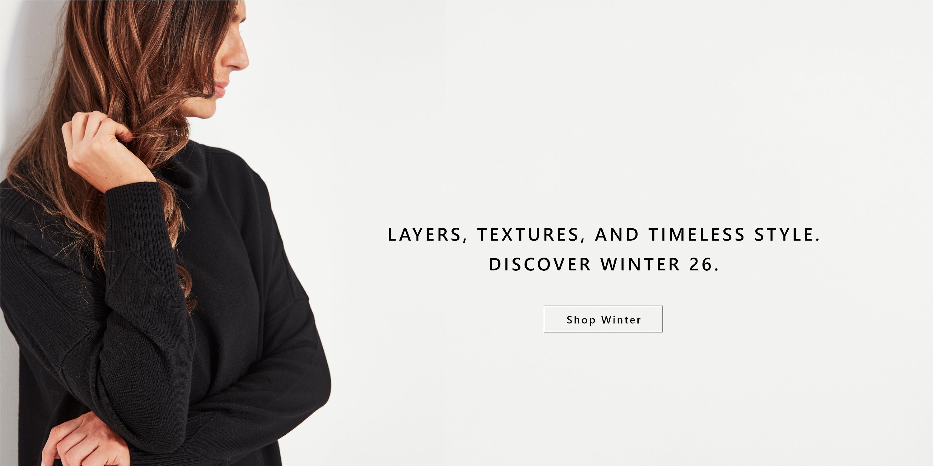 Woman wearing a black sweater by Verge with text promoting winter fashion collection.