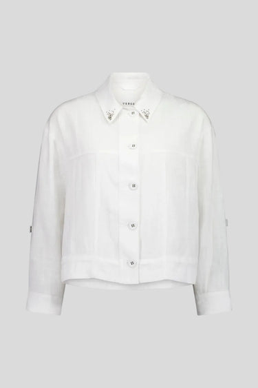 A white cropped button-up shirt jacket by Verge with decorative silver embellishments on the pointed collar and cuffs, shown against a plain white background.