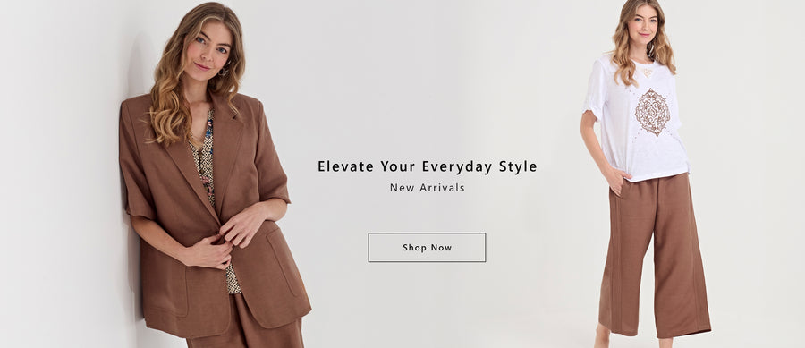 A promotional fashion banner showing two women modeling Verge clothing against a light gray background. On the left, a woman wears a brown blazer over a patterned top with matching brown bottoms.
