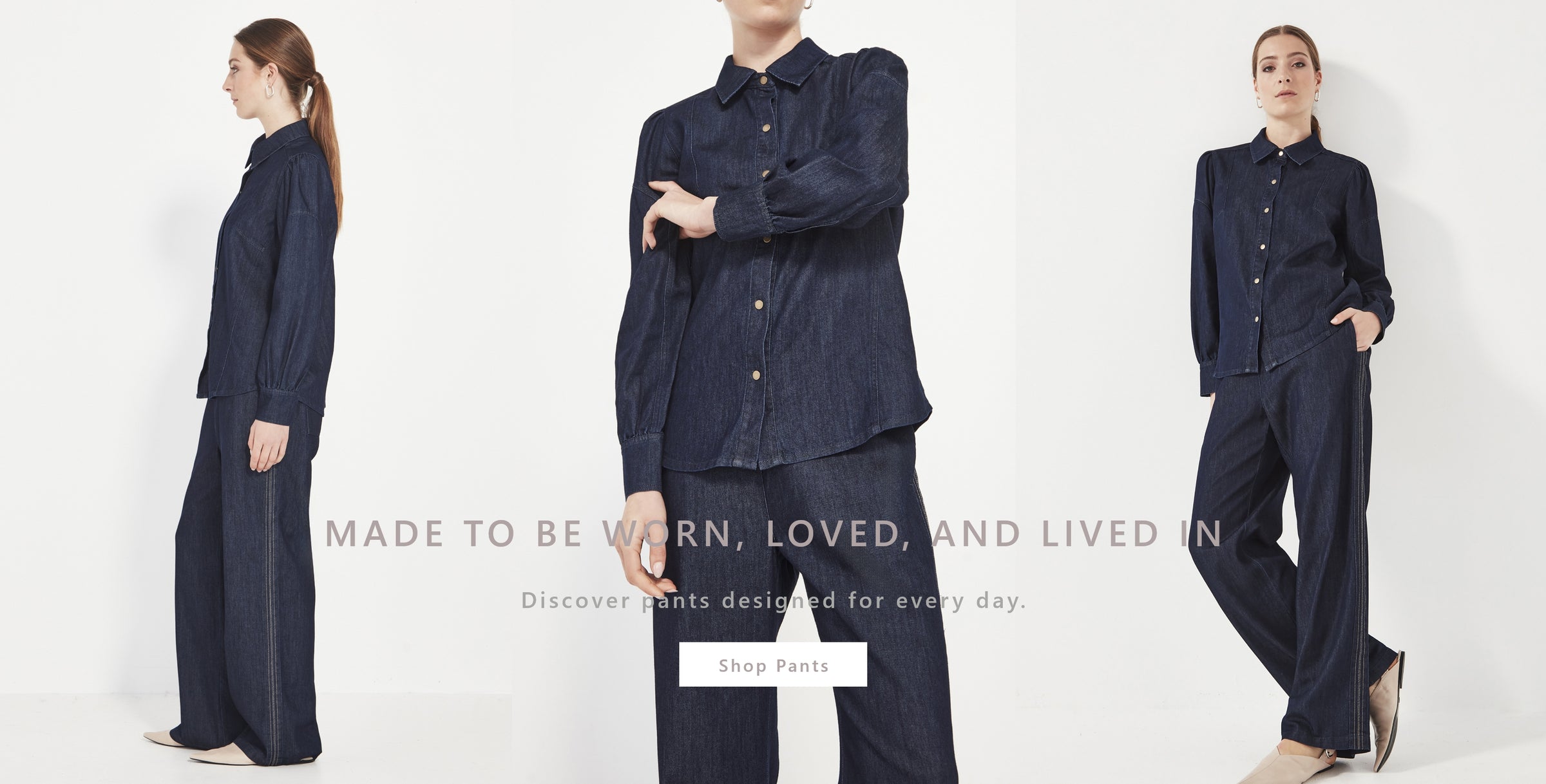 Woman wearing a dark denim outfit by Verge with text about the clothing's design.