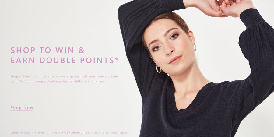 Woman wearing a black long-sleeve top by Verge with promotional text on a light gray background