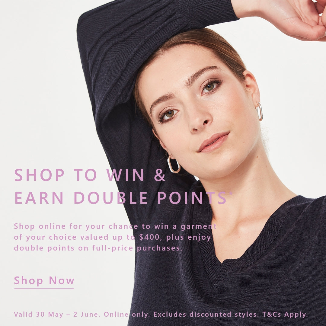 Woman wearing a black long-sleeve top by Verge with promotional text on a light gray background